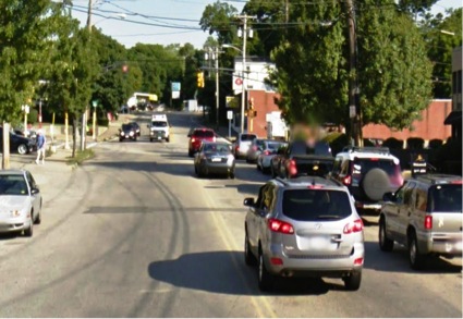 FIGURE 4. Street-view photo that shows drivers forming two travel lanes on Washington Street during peak travel period
